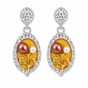 گوشواره زنانه استیل مدل میناکاری طرح بیضی
