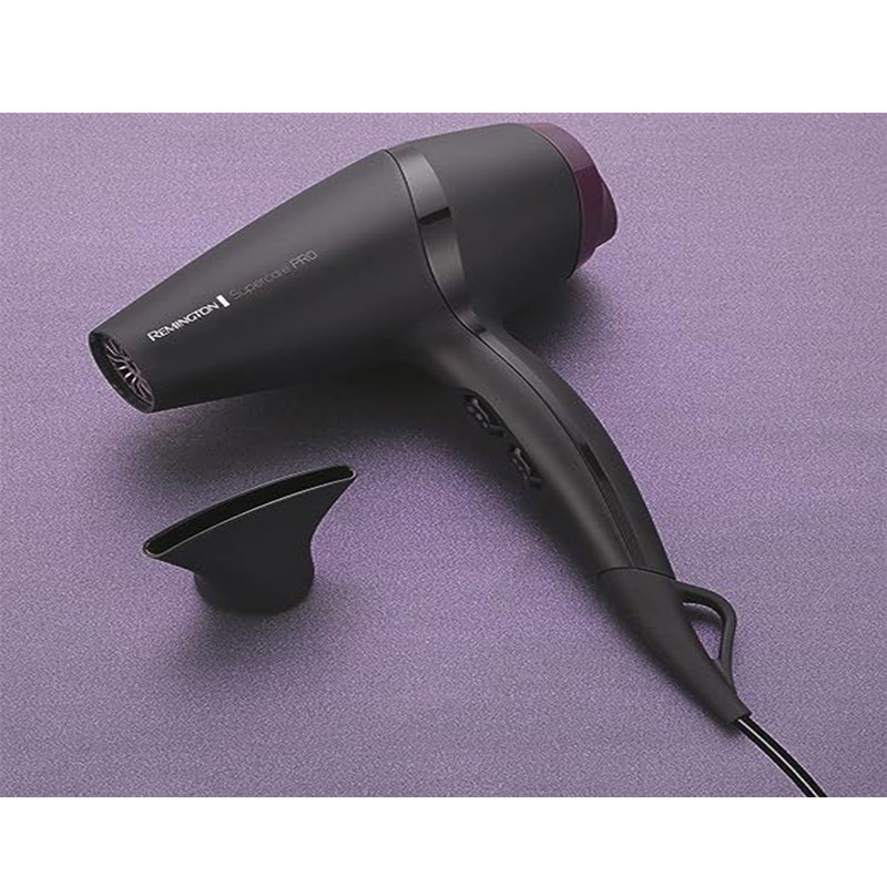سشوار حرفه‌ای رمینگتون مدل AC7100 SUPERCARE PRO با توان 2100 وات، موتور AC، المنت سرامیکی، سرعت پرتاب باد 110 کیلومتر بر ساعت، طراحی سبک و جمع‌وجور، مناسب استفاده حرفه‌ای و خانگی