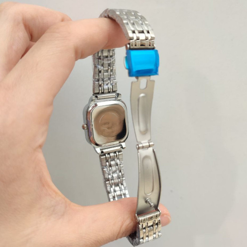 ساعت مچی عقربه ای زنانه مدل کژوال بند استیل طرح حصیری کد 1.2 ساعت مچی عقربه ای زنانه مدل کژوال بند استیل طرح حصیری کد 1.2