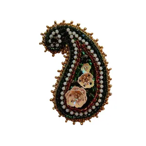 گل سینه زنانه مدل سرو خمیده