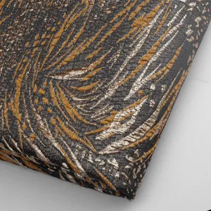 پارچه مانتو مدل ژاکارد مجلسی طرح گل برجسته ترک 1