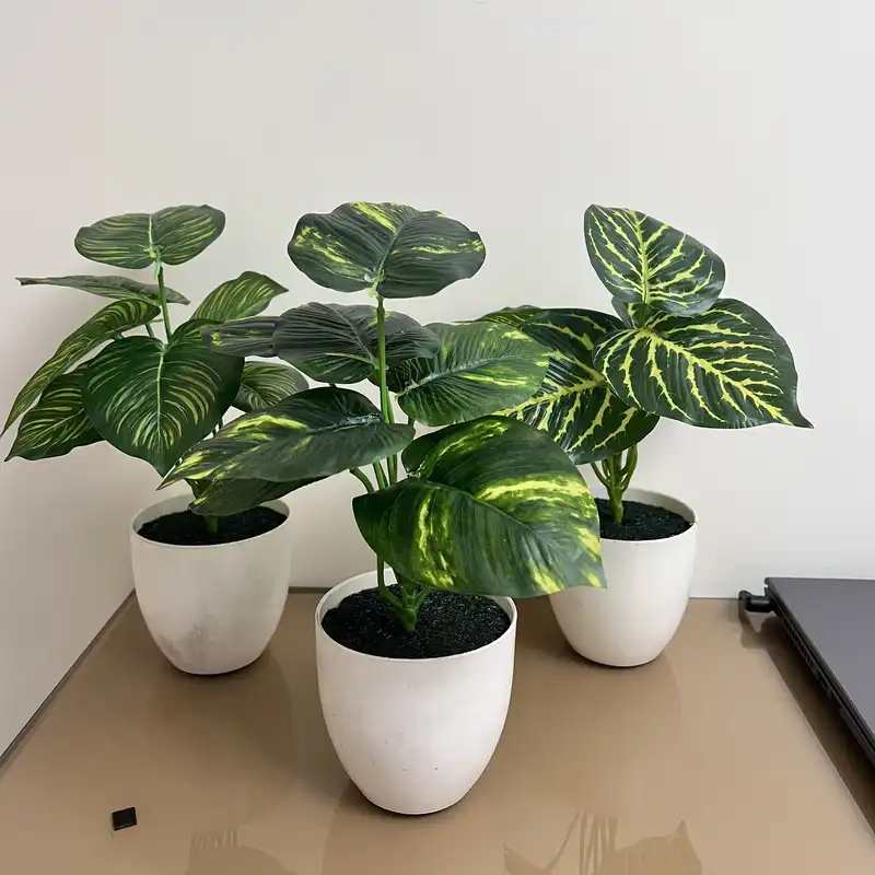 گلدان به همراه گل مصنوعی مدل مدل پتوس مجموعه 3 عددی