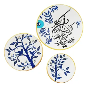 بشقاب دیوارکوب سفالی طرح وإن یکاد کد D224 مجموعه 3 عددی