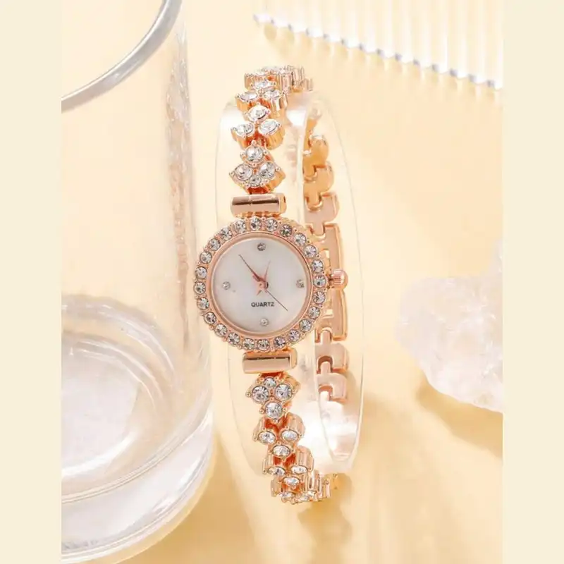 ساعت مچی عقربه ای زنانه مدل دور نگین شکوفه کد 03