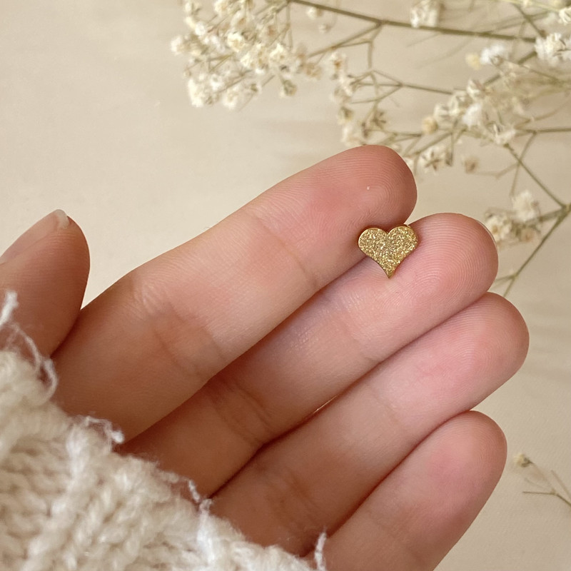 پیرسینگ گوش مدل قلب اکلیلی