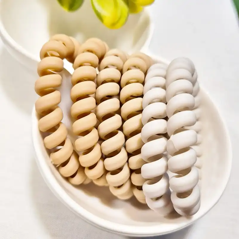 کش مو زنانه مدل سیم تلفنی مات شمعی کد brg 1001 بسته 2 عددی