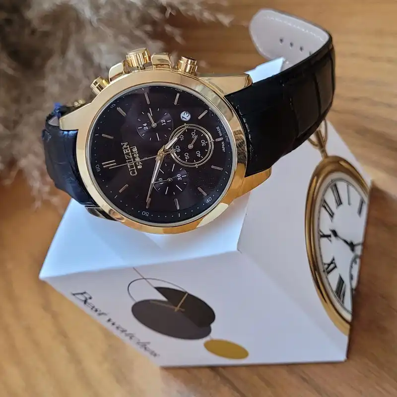 ست ساعت مچی عقربه ای زنانه و مردانه  مدل سه موتور فعال کورنوگراف قفل پروانه ای بند چرمی TmM