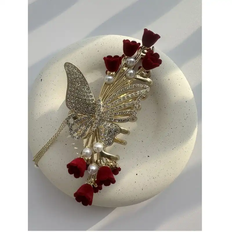 کلیپس مو زنانه مدل فلزی پروانه آویزدار