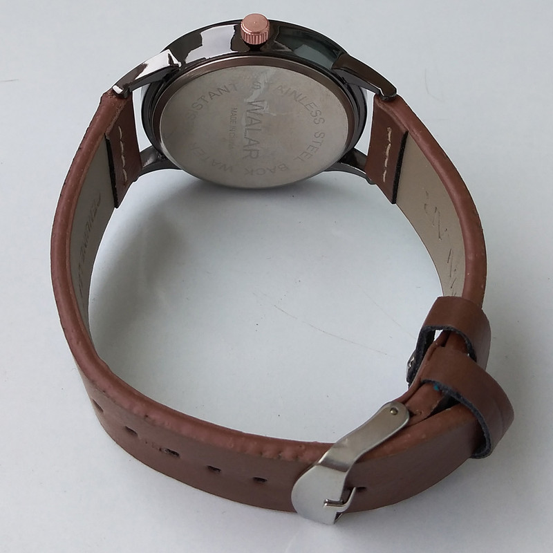 ساعت مچی عقربه ای پسرانه مدل بندچرمی کد 0254 ساعت مچی عقربه ای پسرانه مدل بندچرمی کد 0254