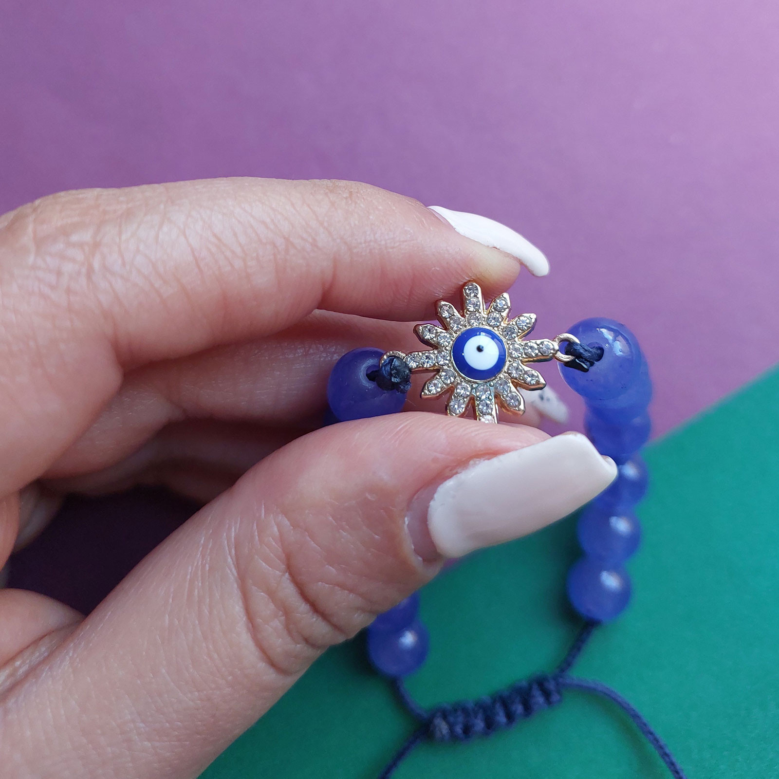 دستبند زنانه مدل چشم نظر طرح خورشید کد HC245