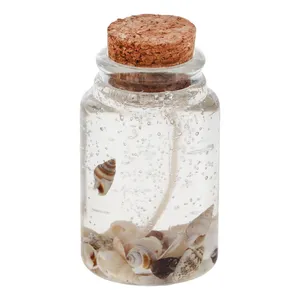 شمع طرح صدف مدل شیشه ای