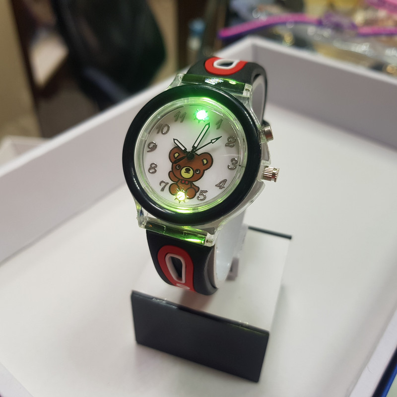 ساعت مچی عقربه ای بچگانه مدل چراغدار عروسکی کد 88ki29 ساعت مچی عقربه ای بچگانه مدل چراغدار عروسکی کد 88ki29