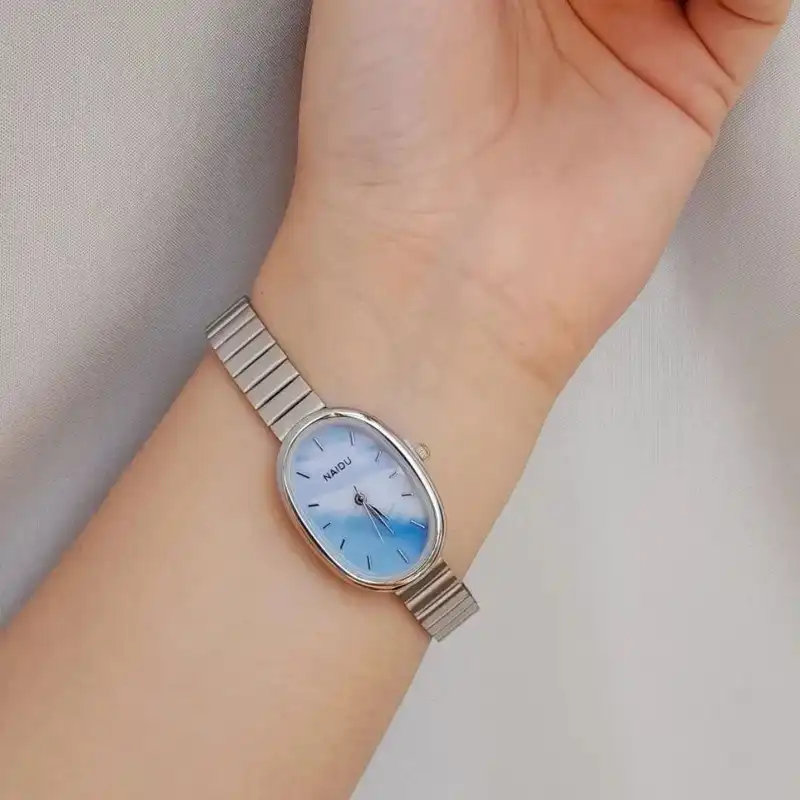 ساعت مچی عقربه ای زنانه مدل بند ریلی نایدو 01