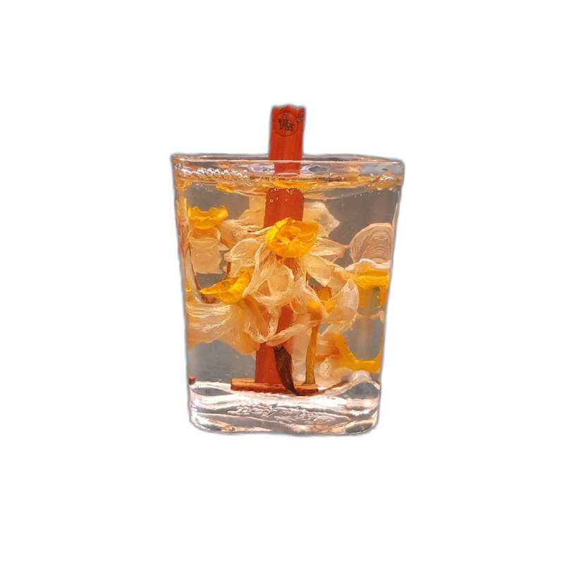 شمع لیوانی مدل تزیینی طرح گل نرگس