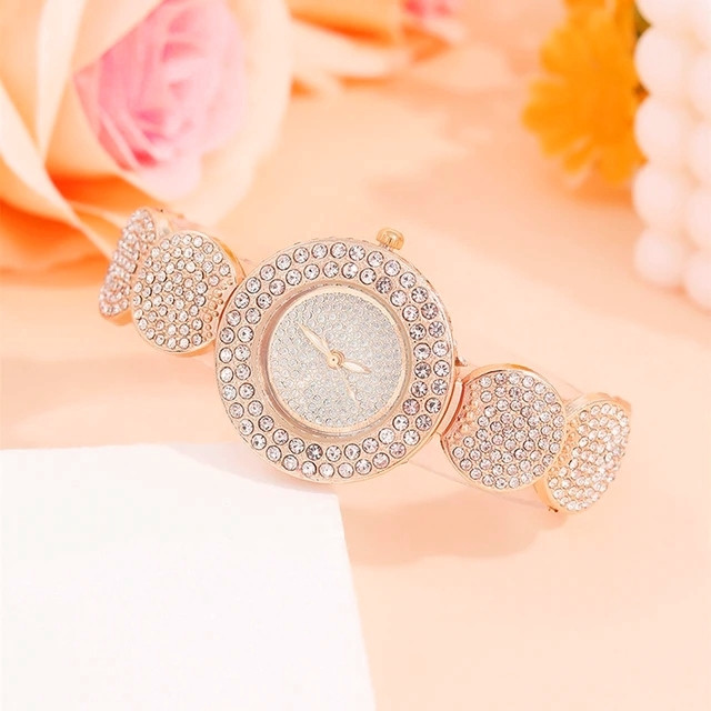 ساعت مچی عقربه ای زنانه مدل دستبندی فول نگین استون طرح جواهر کد 3