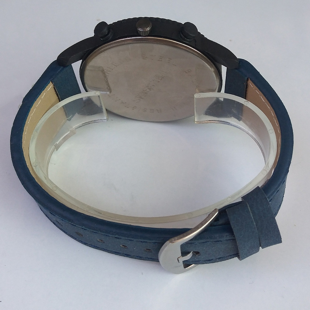 ساعت مچی عقربه ای پسرانه مدل بند چرمی کد 009 ساعت مچی عقربه ای پسرانه مدل بند چرمی کد 009