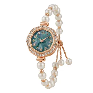 ساعت مچی عقربه‌ای کوارتز زنانه مدل لوکس مینیمال قاب دور نگین قفل کرواتی بند مرواریدی کد ۳