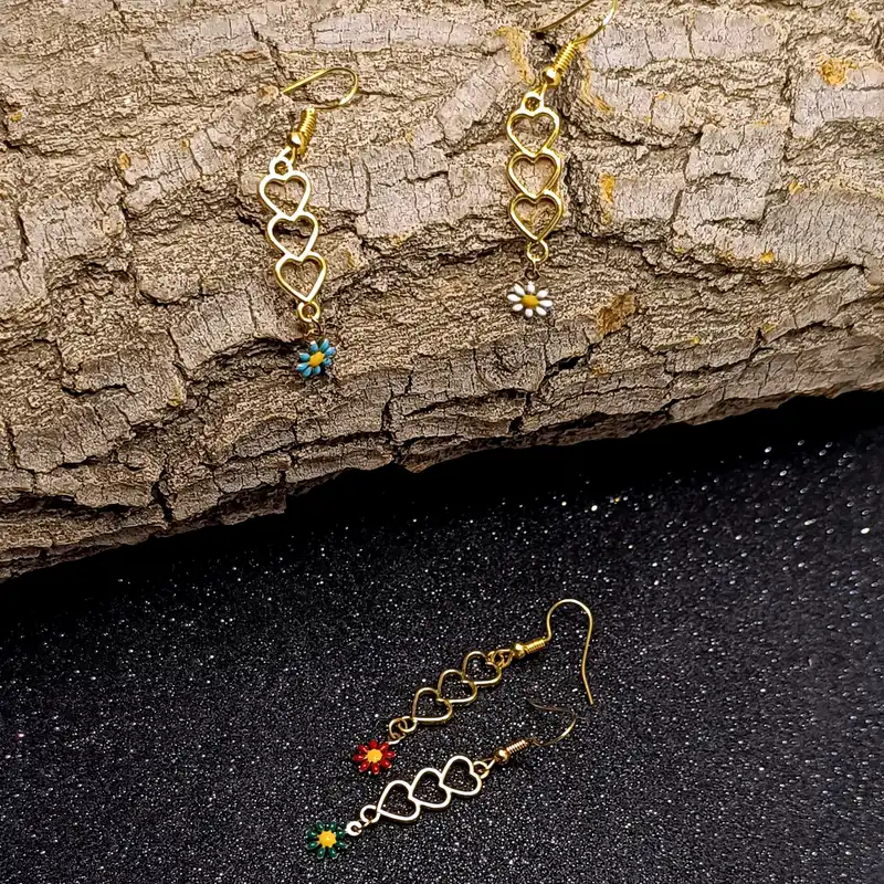 گوشواره زنانه مدل قلب و بابونه کد RKH_179