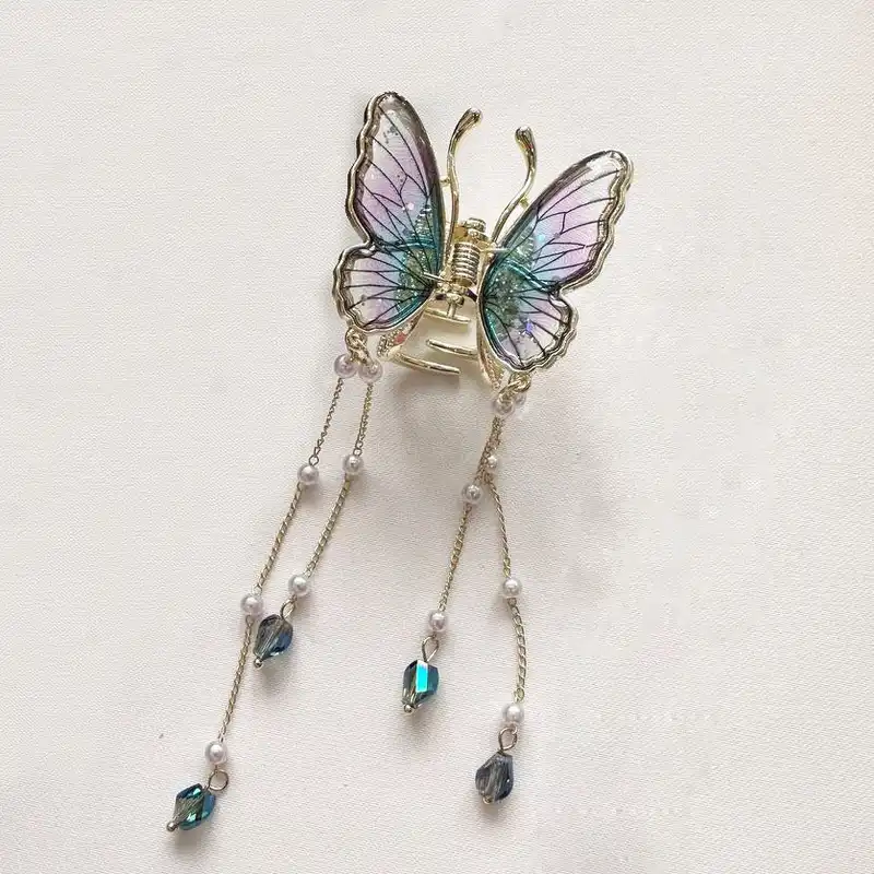 کلیپس مو زنانه مدل پروانه ای آویز دار رویه کریستالی کد 102001528