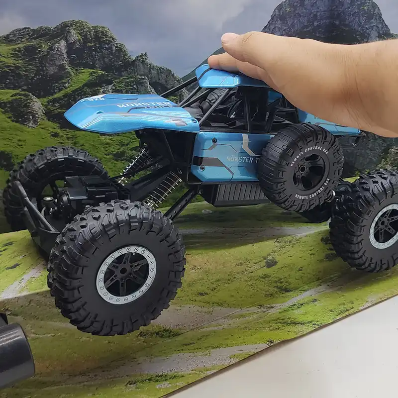 ماشین بازی کنترلی مدل 4 چرخ متحرک آفرود طرح فنردار