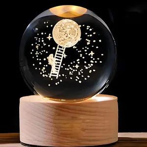 چراغ خواب مدل گوی کریستال طرح ماه و فضانورد نردبان