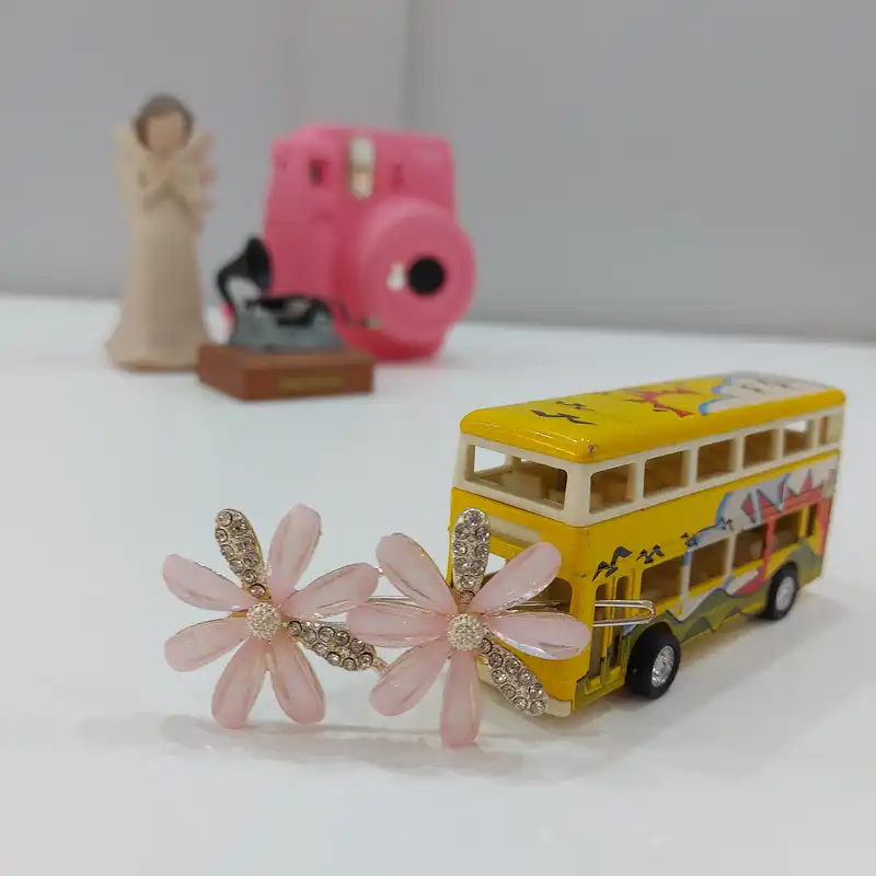 گیره مو زنانه مدل بابونه طرح گل