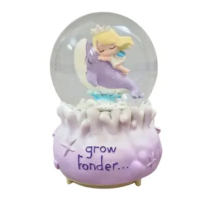 گوی موزیکال مدل پمپی دختر و دلفین طرح grow Fonder کد A02