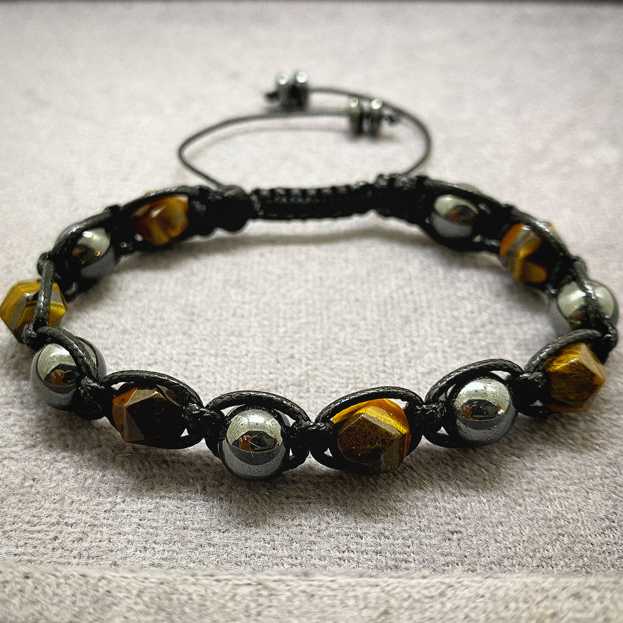 دستبند زنانه مدل بافت سنگ چشم ببر و حدید دستبند زنانه مدل بافت سنگ چشم ببر و حدید