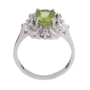 انگشتر نقره زنانه بازرگانی میلادی مدل زبرجد قالب جواهری نگین برلیان ابکاری رادیوم کد AWR_1302