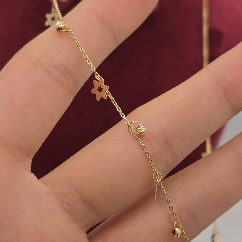 گردنبند طلا کم اجرت 18 عیار زنانه با زنجیر حلقه‌ای (فلامینگو) طلا و شمش برلیان مدل پولکی گوی و ستاره 
