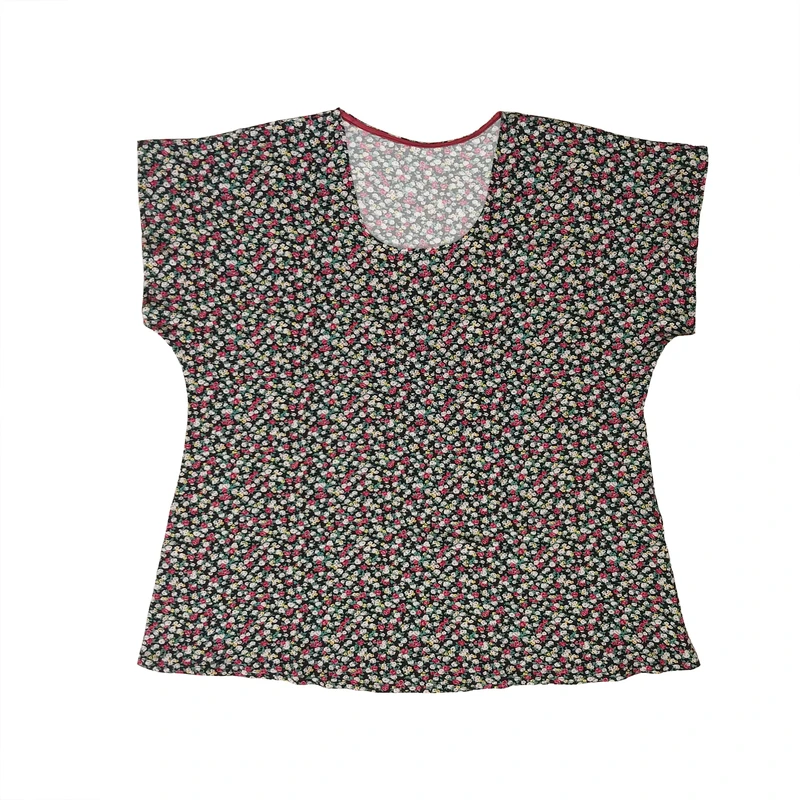 بلوز آستین کوتاه یقه گرد زنانه مدل نخی طرح گل ریز