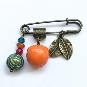 سنجاق سینه زنانه مدل پرتقال