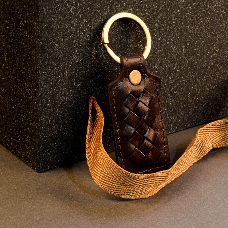 عکس شماره 11 : جاکلیدی چرمینه اسپرت مدل بافت