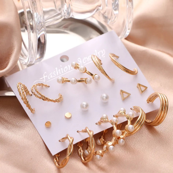 گوشواره زنانه مدل حلقه ای پیچی مجموعه 9 عددی گوشواره زنانه مدل حلقه ای پیچی مجموعه 9 عددی