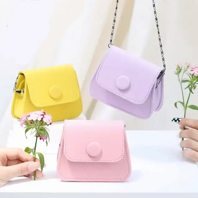 کیف رودوشی زنانه مدل دکمه ای کوچک