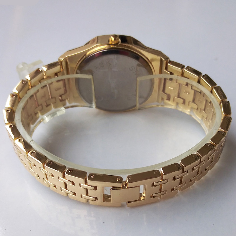 ساعت مچی عقربه ای زنانه مدل بندفلزی نگین دار کد 02 ساعت مچی عقربه ای زنانه مدل بندفلزی نگین دار کد 02