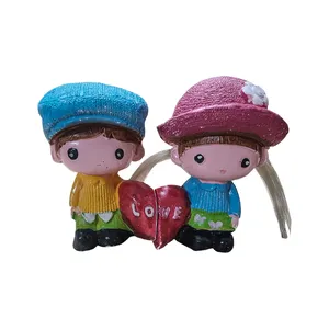 مجسمه مدل دختر و پسر کلاه به سر کد 500 بسته دو عددی