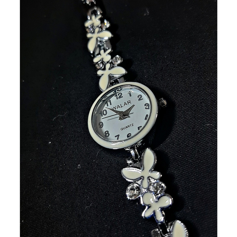 ساعت مچی عقربه ای دخترانه والار مدل زنجیری گلدار