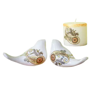 دکوری مدل پرنده طرح بته جقه بسته 2 عددی به همراه شمع