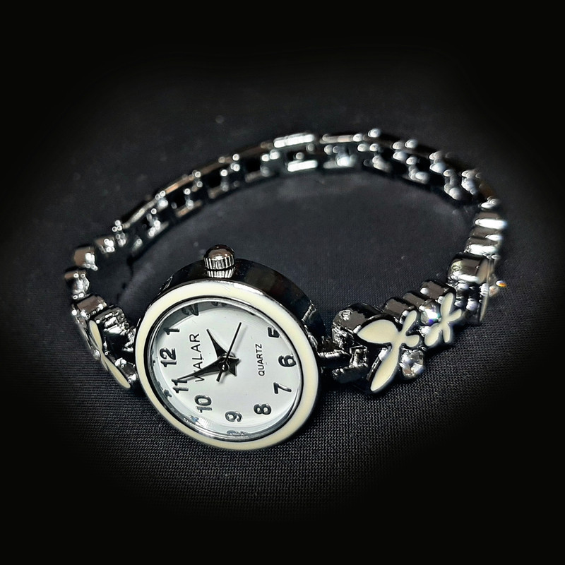 ساعت مچی عقربه ای دخترانه والار مدل زنجیری گلدار