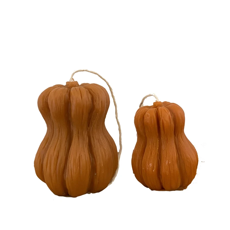 شمع دست ساز بدون بو مدل کدو حلوایی کد 502 زمان اتمام 2 ساعت مجموعه 2 عددی