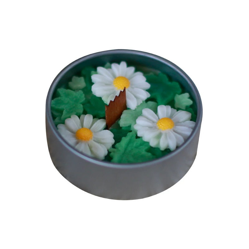 شمع دست‌ساز بدون‌بو مدل قوطی گل های بابونه زمان اتمام 8 ساعت