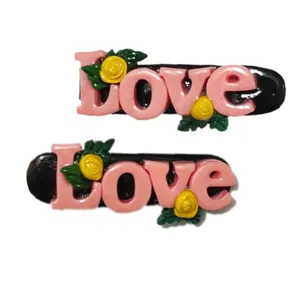 گیره مو زنانه مدل love بسته 2 عددی