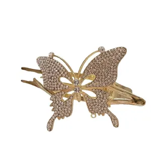 گیره مو زنانه مدل انبری نگین دار طرح پروانه ای