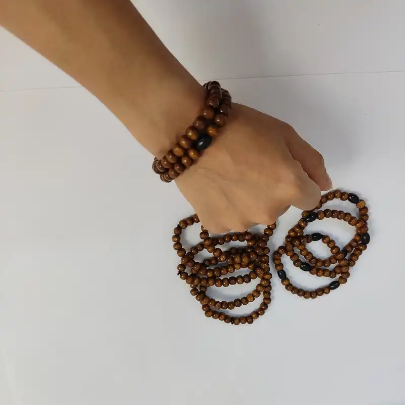 دستبند مدل مهره چوبی مجموعه 10 عددی