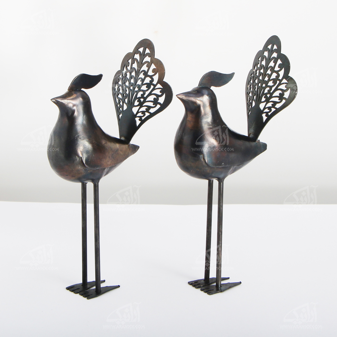 مجسمه فولادی مشبک رنگ ‏ خاکستری تیره‏ طرح ‏پرنده پا بلند‏ مدل 1105700004