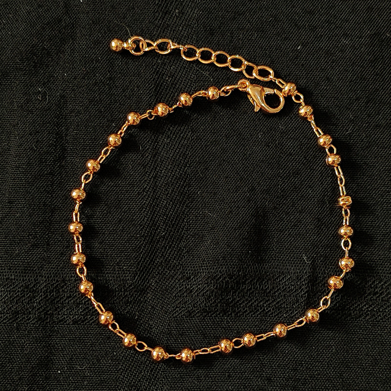 دستبند زنانه اکسسورایز مدل توپی سکه ای و آویزدار بسته سه عددی