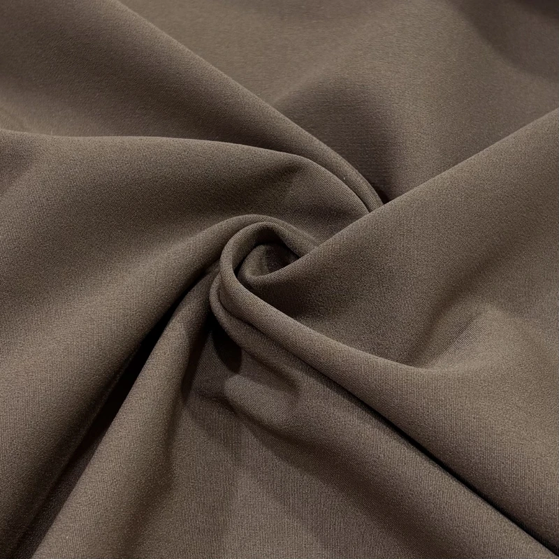 پارچه لباس عرض 1.5 متر مدل والا طرح کرپ رنگ قهوه‌ای