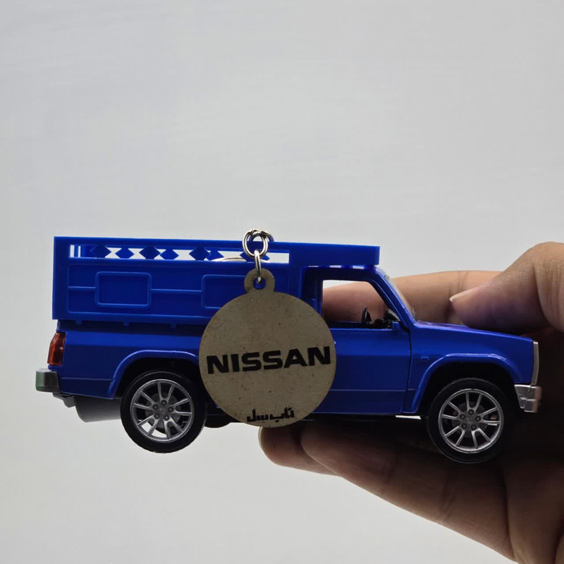 ماشین بازی ناب سل مدل نیسان دودزا فلزی چراغدار موزیکال  NISSAN به همراه جاسوییچی