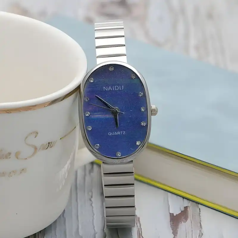 ساعت مچی عقربه ای زنانه مدل بند ریلی 03